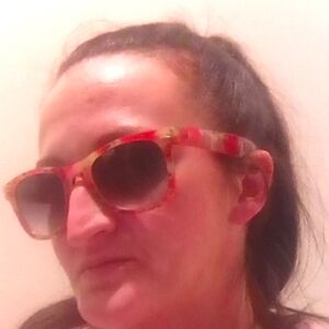 Stylish Red Sunglasses with flowers solar accents good used cond
